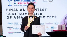 Reeze Choir holding his medal as Best Sommelier of Asia and Pacific 2025.