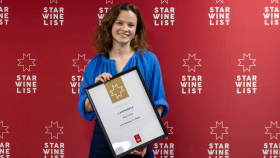 Marie Pérodeau of L'Asphodèle accepts the Gold Star in the Sustainability Prize at Star Wine List of the Year France 2026. Photo by Studio BaALT.