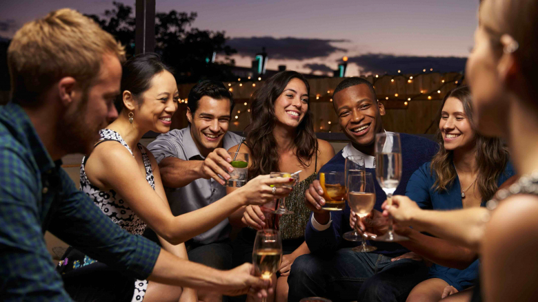 People sharing glasses of wine.
