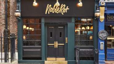 Exterior of Noble Rot Soho, London, UK.