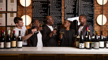 Staff members behind the bar at Culture Wine Bar in Cape Town, South Africa