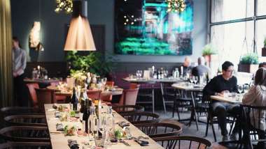 Dining room and wine at Hantverket restaurant in Stockholm, Sweden.