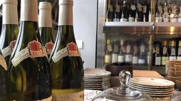 Wine bottles at Grus Grus wine bar in Stockholm, Sweden.