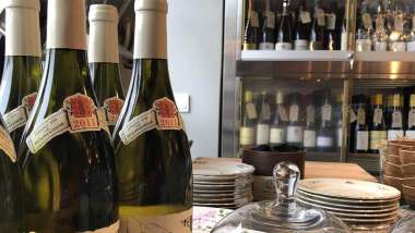 Wine bottles at Grus Grus wine bar in Stockholm, Sweden.