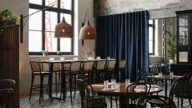 High and low tables in Lore Bistroo, a restaurant and wine bar in Tallinn, Estonia.