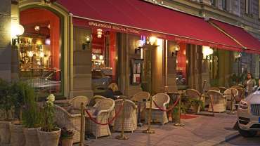 Exterior and terrace of Spanjorskan restaurant and wine bar in Stockholm, Sweden.