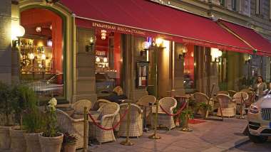 Exterior and terrace of Spanjorskan restaurant and wine bar in Stockholm, Sweden.