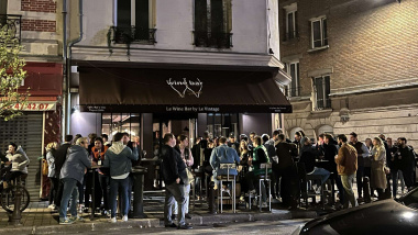 Guests outside Le Wine Bar by Le Vintage in Reims, Champagne region, France.