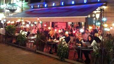 Guests on the terrace of Sturehof restaurant and wine bar in Stockholm, Sweden.