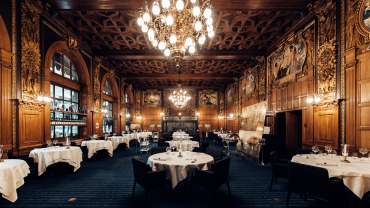Dining room of Michelin star Operakällaren restaurant in Stockholm, Sweden.