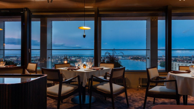 Tables and city views at La Tour restaurant in Stockholm, Sweden.