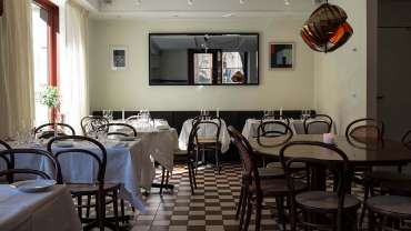 Dining tables at Café Nizza in Stockholm, Sweden.