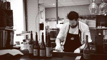 Chefs in the kitchen at Brasserie Bobonne in Stockholm, Sweden.