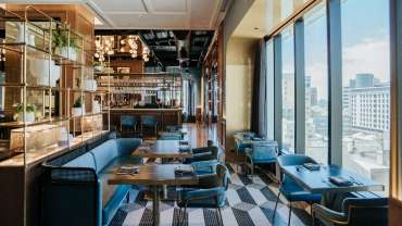 The lounge and skyline views at Garçon Bleu wine bar and restaurant in Adelaide, South Australia.