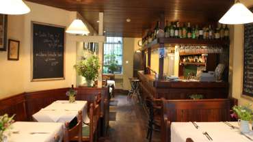 Interior of Andrew Edmunds restaurant, London, UK.