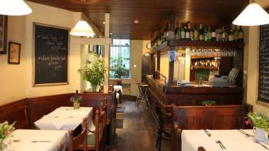 Interior of Andrew Edmunds restaurant, London, UK.