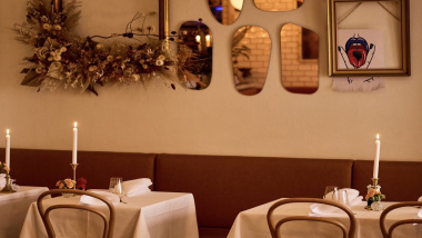 Candles on tables at Coco & Carmen restaurant in Stockholm, Sweden.