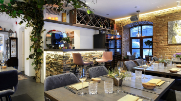 Tables at ANNO restaurant and wine bar in Tallinn, Estonia.