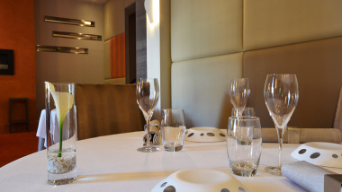 Dining tables at Le Foch Michelin star restaurant in Reims, Champagne region, France.