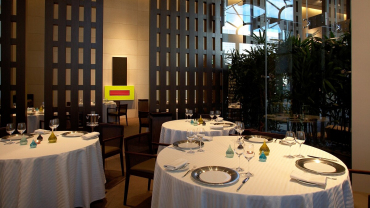 Dining tables at Guy Savoy restaurant in Caesars Palace, Las Vegas, USA.