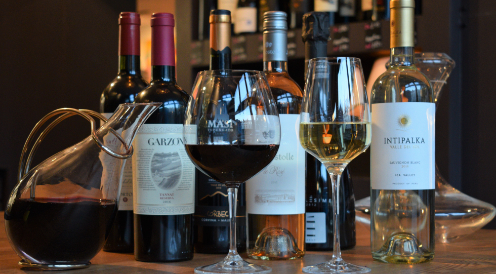 Bottles and wine glassas at Paladar, London, UK.