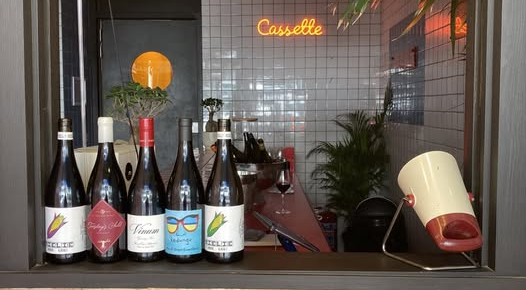 Bottles on the bar at Star Wine List Red Star: Cassette wine bar in Cape Town, South Africa.