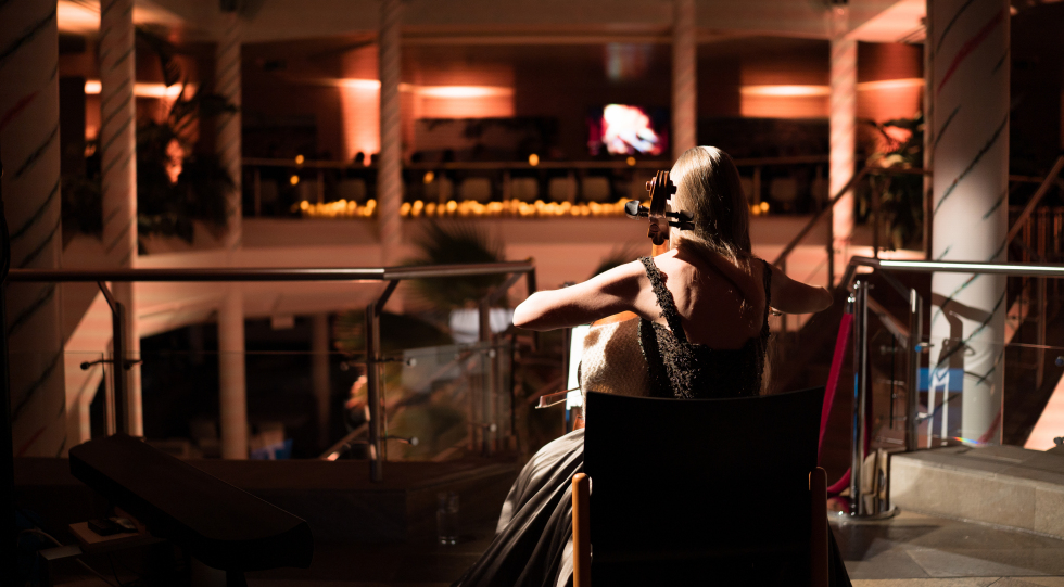 Cello playing at DEKRA Congresshotel, Altensteig, Germany.