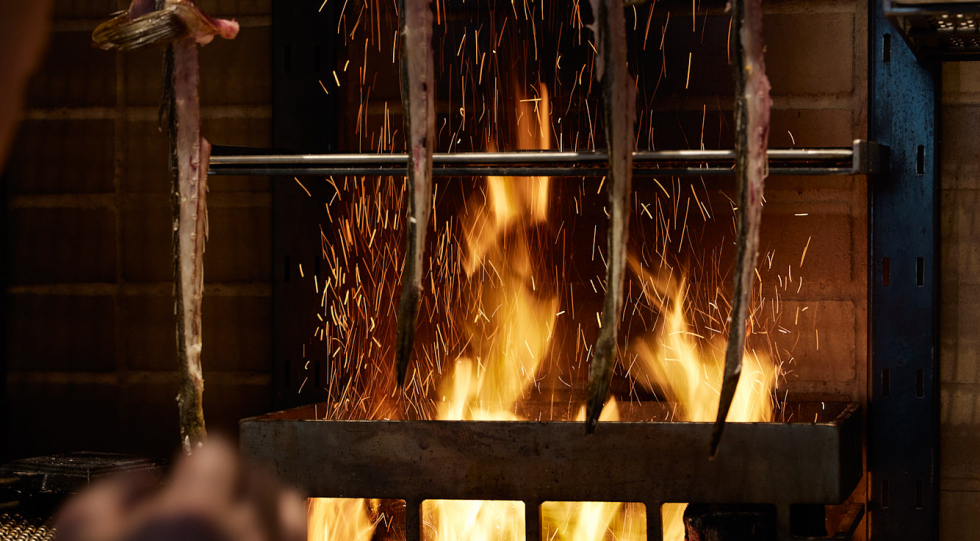 Open fire at Poetica Bar & Grill, Sydney, Australia.