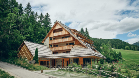 Exterior of Vila Planinka hotel and restaurant in Jezersko, Slovenia.