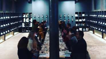 Bottles and tables at Openwine wine bar in Cape Town, South Africa - a Star Wine List Red Star wine destination.