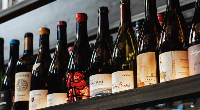 Bottle shelf at MAD, Clisson, Loire, France.